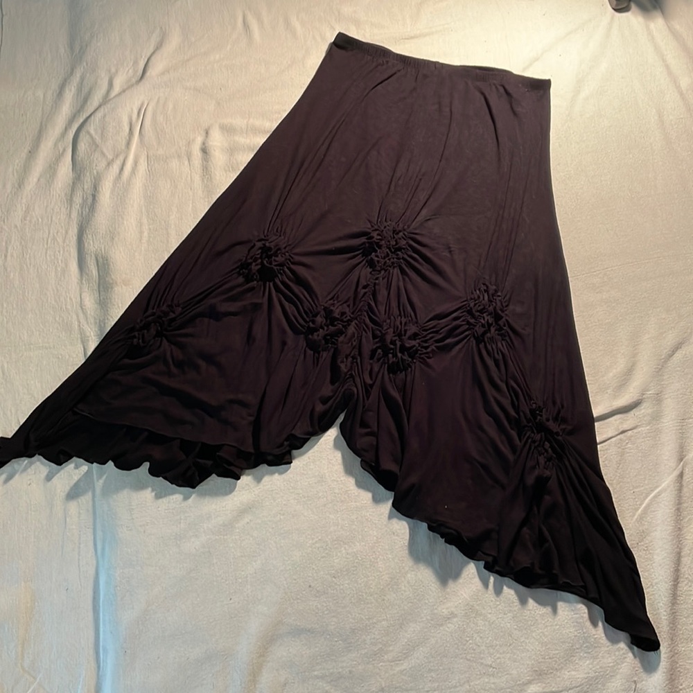 Venezia-Milan black asymmetric midi skirt with raised design on front and back